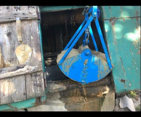 Грейфер для чистки криниці